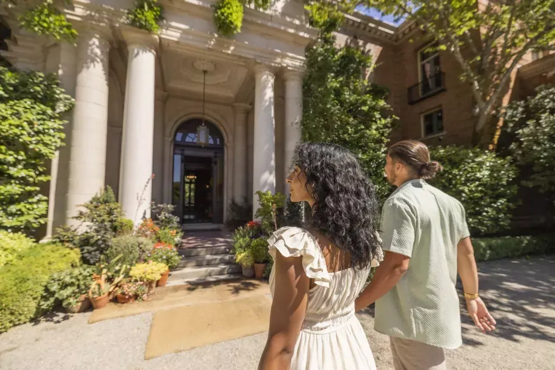 Visitors enter the house on the Filoli grounds.